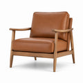 Sillón de madera con tapicería de piel sintética marrón