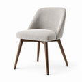 Silla comedor tapizada en tela de pana gris con patas de madera maciza