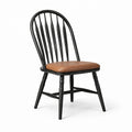 Silla de comedor negra con asiento de cuero sintético marrón